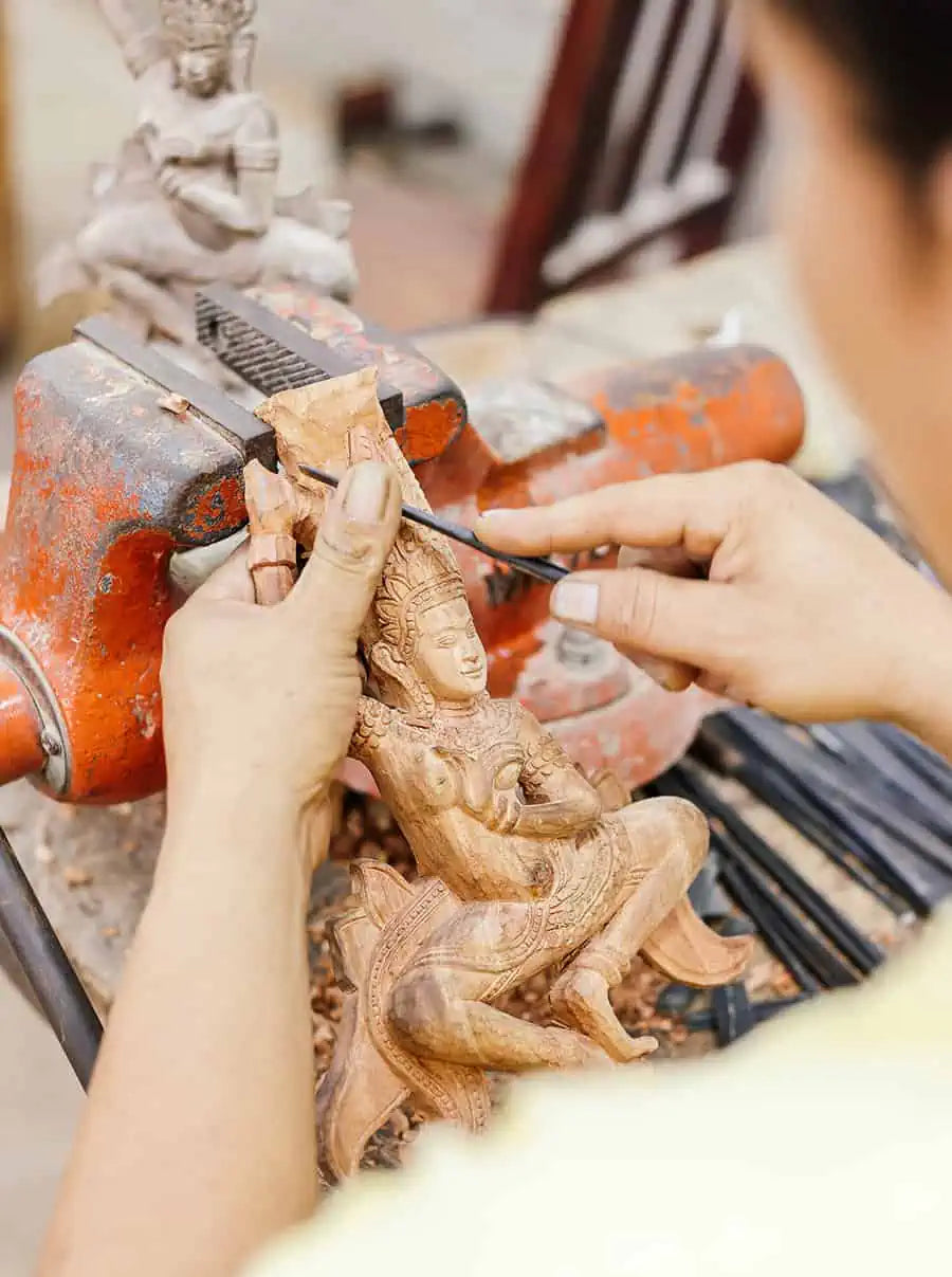 Khmer wood carving craftsmanship at Artisans Angkor